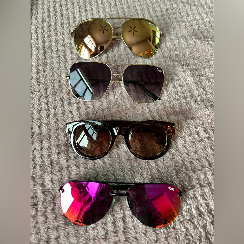 4 pairs of women’s sunglasses.